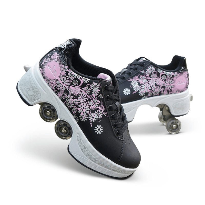 side view of black Kick Speed floral roller skate shoes for girls with pink flower pattern