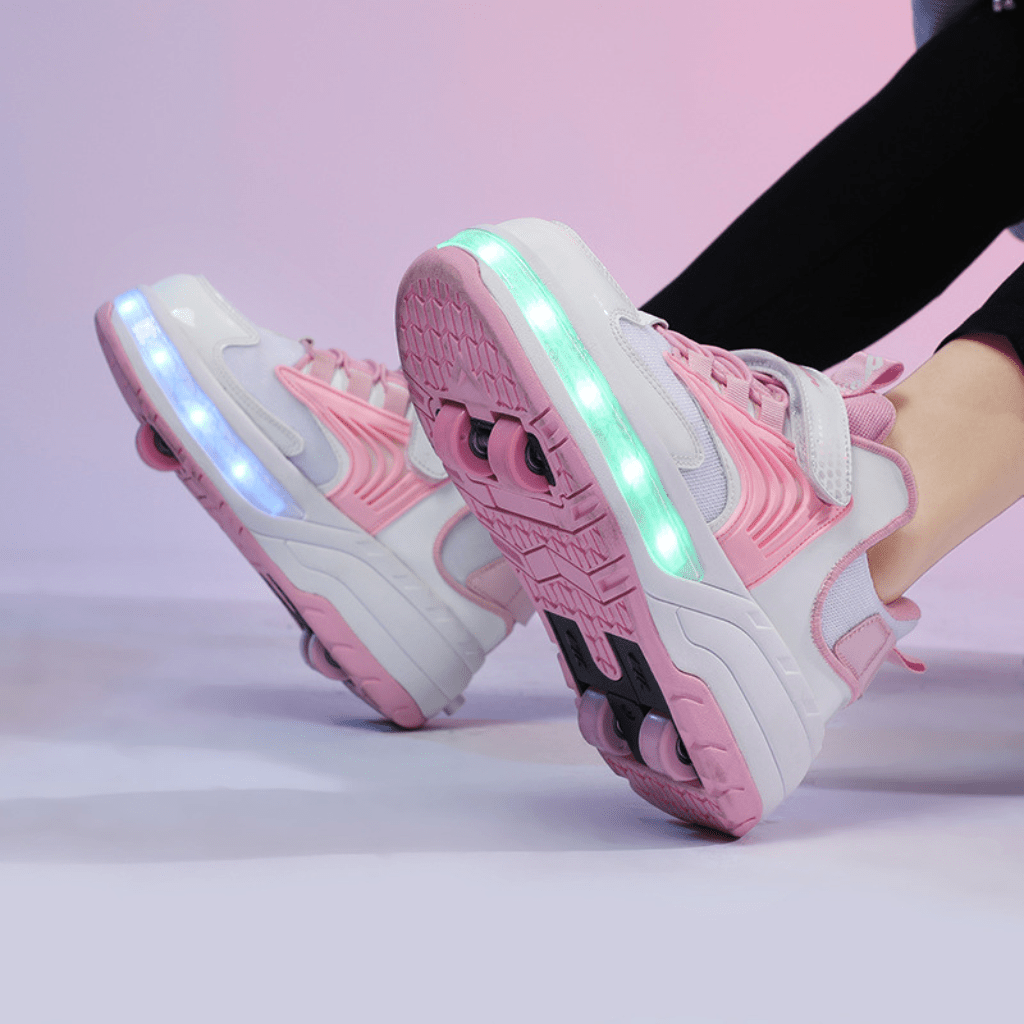 bottom of pink Kick Speed Pro-X LOW LED heel wheels shoes glowing