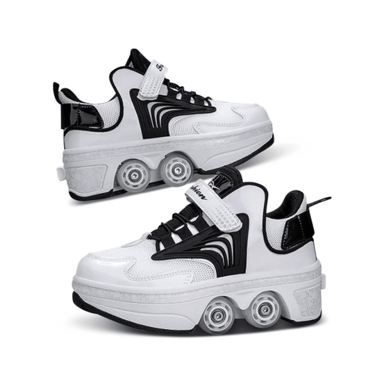 angled side view of white and black roller skate shoes highlighting durable sole and retractable wheels