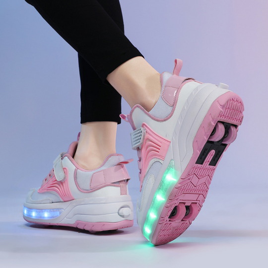 Studio shot of pink Kick Speed heel wheels shoes, stylish LED sneakers