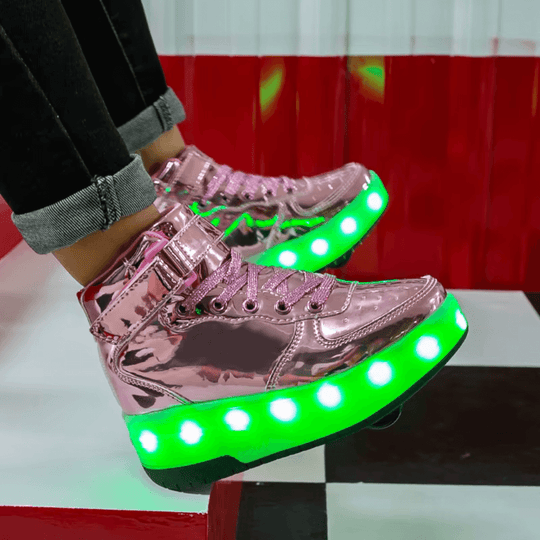 Pink heel wheel roller shoes with green LED lights worn indoors, shoes with wheels for kids
