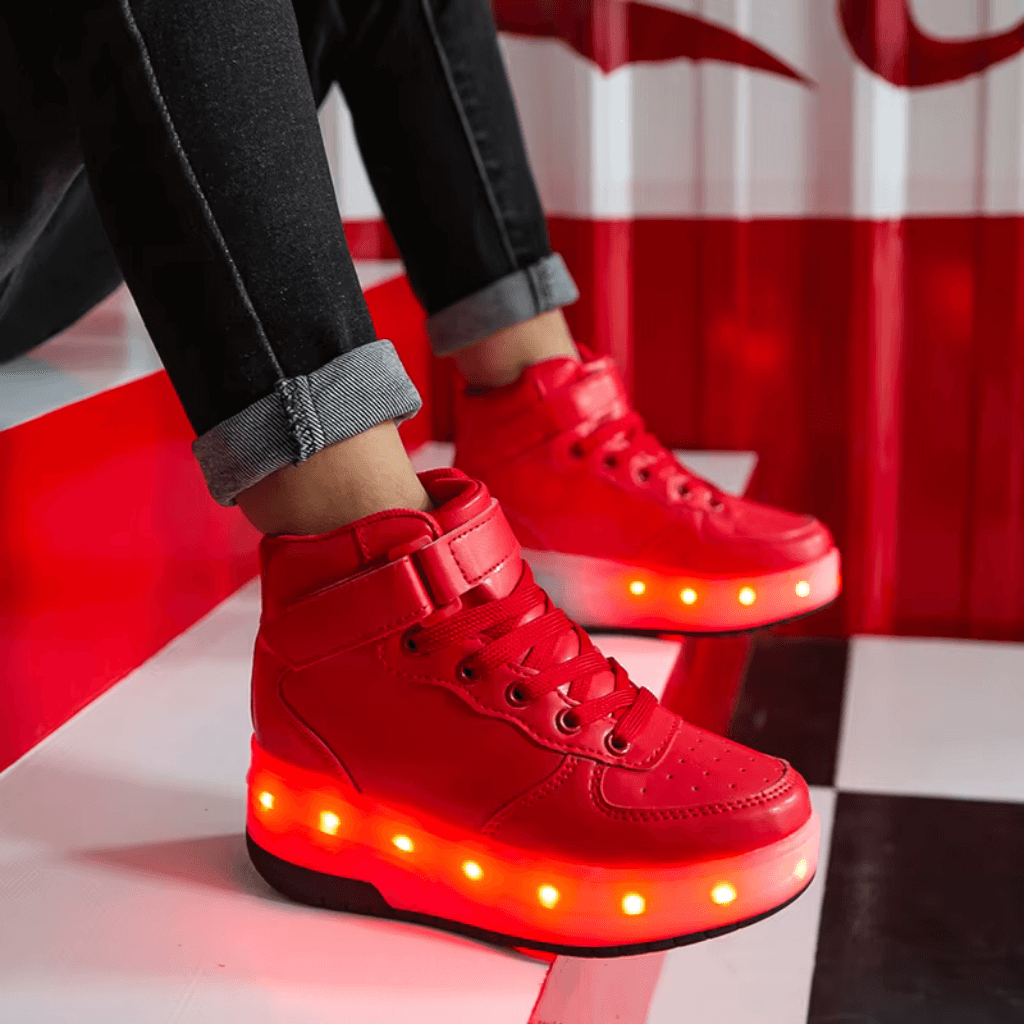 Red heel wheel roller shoes with bright red LED lights worn indoors