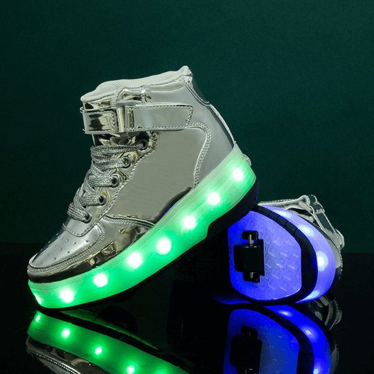 Silver heel wheel roller shoes with LED lights standing on dark surface