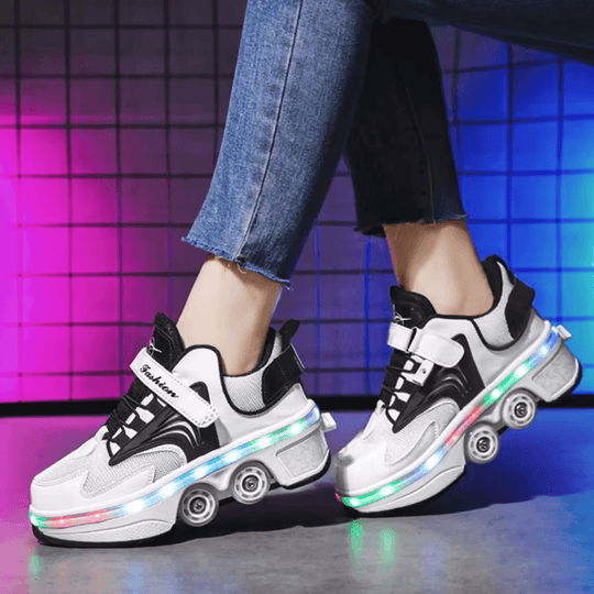 Black and white LED shoes with wheels glowing while worn indoors