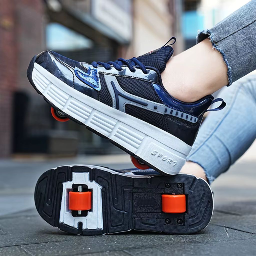 A woman wearing a pair of blue roller skate shoes with detachable wheels, shown with one shoe lifted and the other turned upside down to display the sole and wheels, set against an outdoor urban background