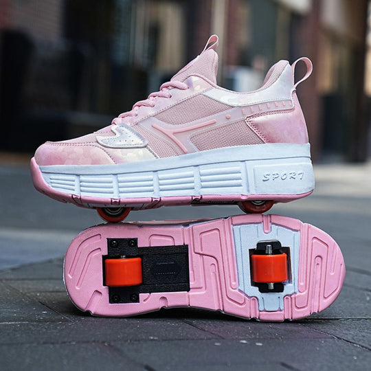 A pink shoes with built-in roller wheels, shown with the other shoe flipped over to display the underside and wheels, set against a blurred outdoor street background