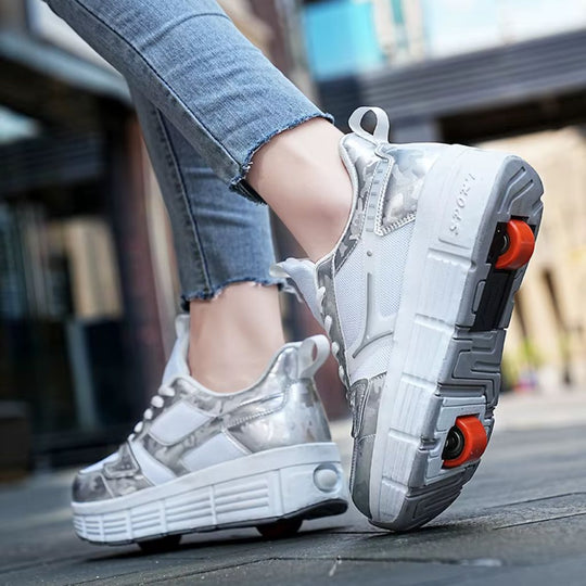 A person wearing a pair of chunky white roller skate shoes with wheels, shown in a city street setting