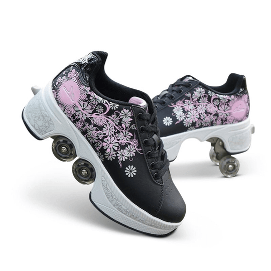side view of black Kick Speed floral roller skate shoes for girls with pink flower pattern