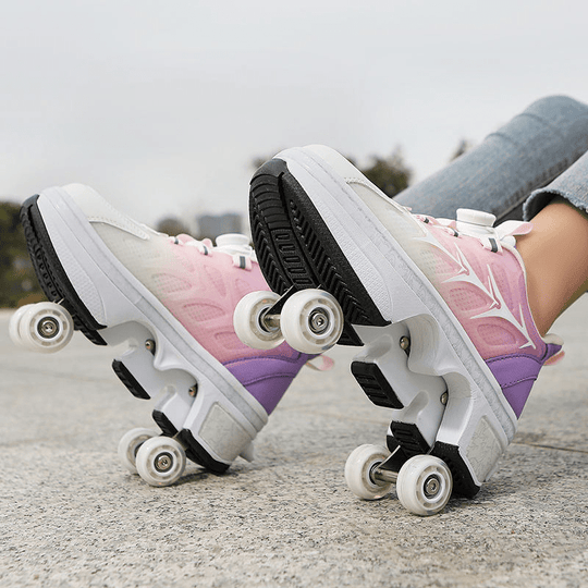pink women's shoes with wheels for kids in motion showing four-wheel setup