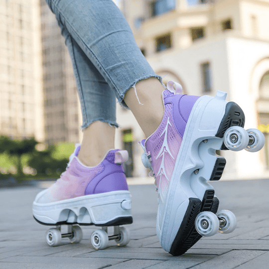 pair of pink and purple low-top retractable roller shoes for kids shown in motion view