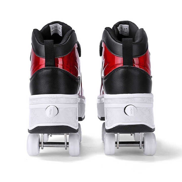 back view of black and red roller skate shoes showing heel and pop-out wheels mechanism
