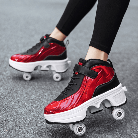 red roller skate shoes with pop out wheels on the bottom in action on asphalt