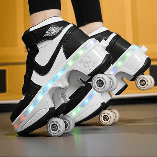 black and white LED roller shoes for kids and adults, mid-top design showing glowing sole and durable non-slip rubber outsole