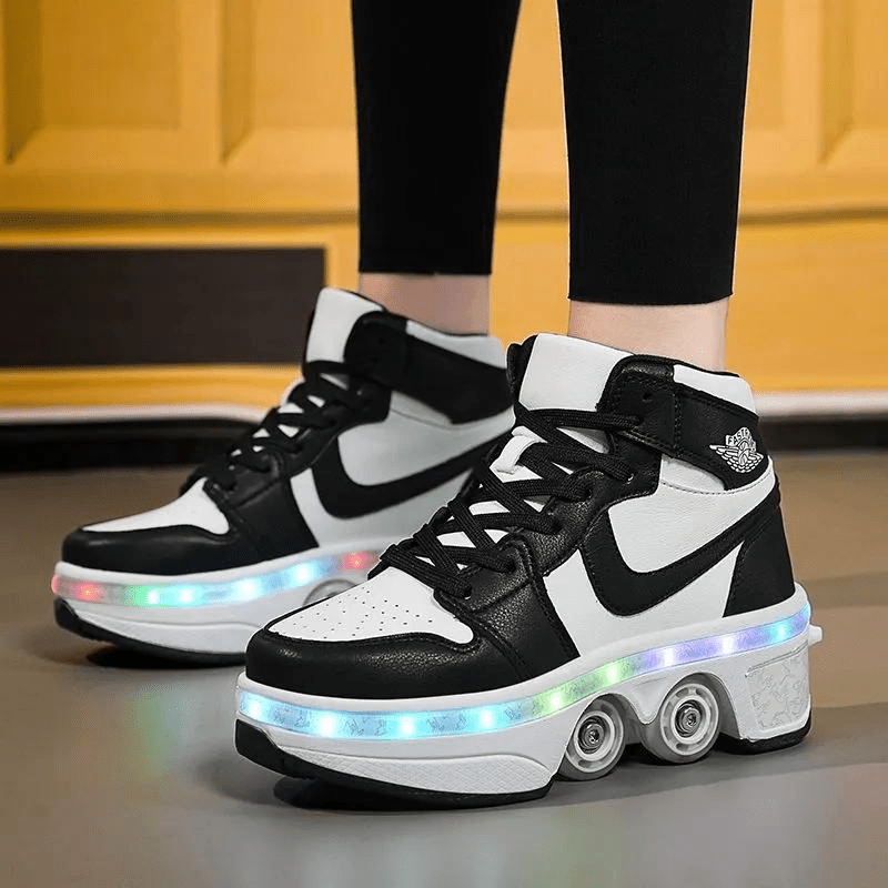 man wearing black Kick Speed Kick Air MID Roller Skate Shoes LED, side view, showing retractable 4 wheel design on shiny surface
