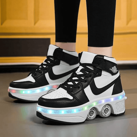 man wearing black Kick Speed Kick Air MID Roller Skate Shoes LED, side view, showing retractable 4 wheel design on shiny surface