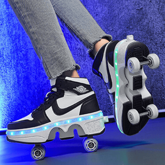 close-up of black Kick Speed LED roller skate shoes on floor, retractable wheels and bright sole lighting effect visible