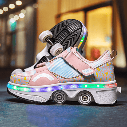 pink Kick Speed LED shoes with wheels for girls glowing brightly during night skating