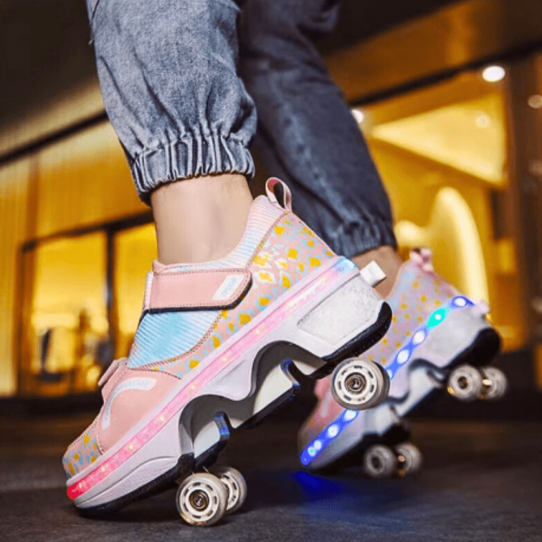 Kick Speed pink LED roller shoes for girls mid-motion with visible glow and retractable wheels