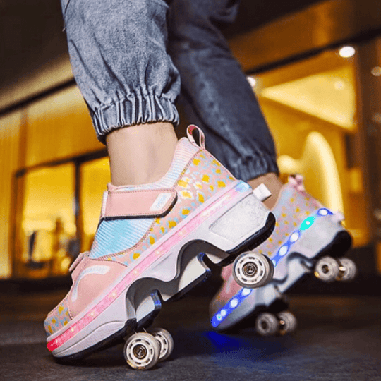 Kick Speed pink LED roller shoes for girls mid-motion with visible glow and retractable wheels