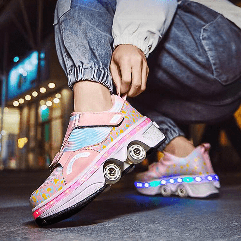 pink LED roller shoes with wheels for girls from Kick Speed worn during city skating on night street