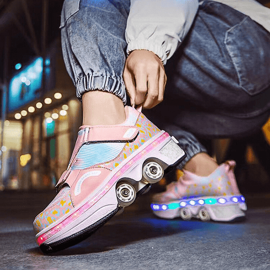 pink LED roller shoes with wheels for girls from Kick Speed worn during city skating on night street