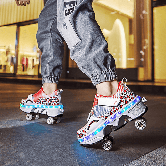 low-angle perspective of red LED Kick Speed roller skate shoes shining during street performance