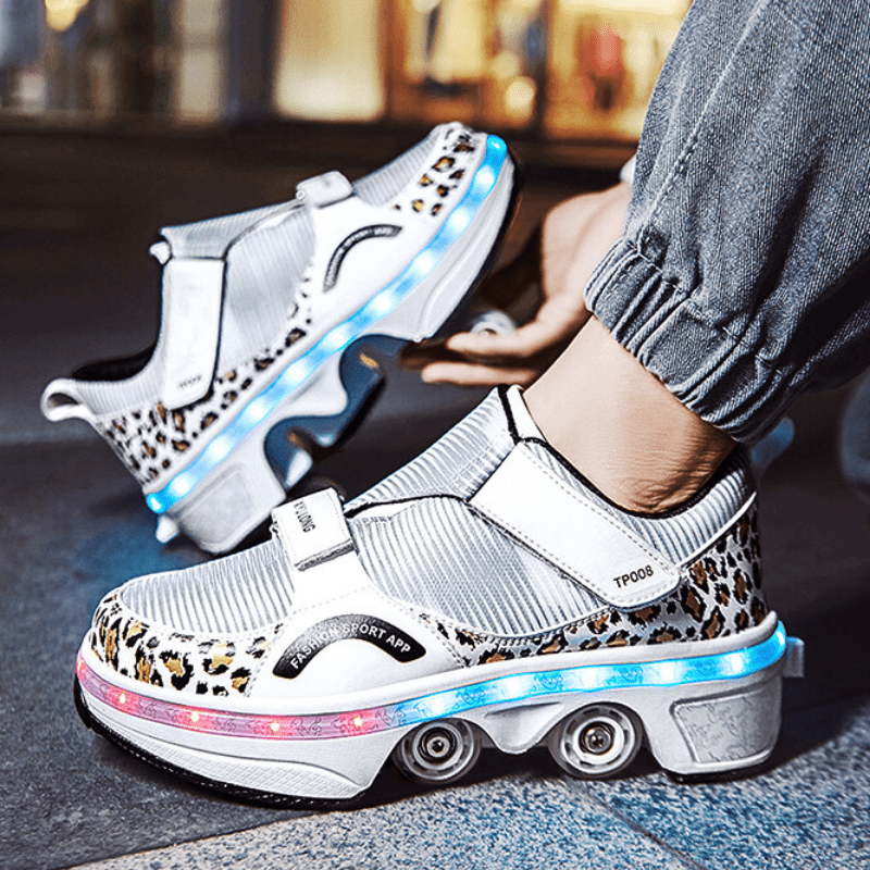 white Kick Speed roller shoes with LED lights, leopard print trim, and retractable wheel system glowing under soft light