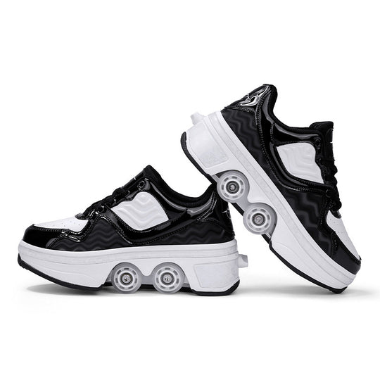 side view of black Kick Speed NeoWave Roller Skate Shoes pair studio photo on white background, retractable roller shoes with wavy design