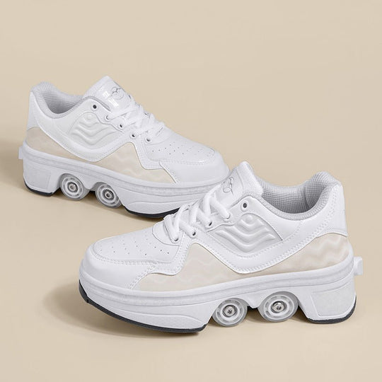 white roller skate shoes on beige background, elegant 4 wheel shoes with pop-out wheels