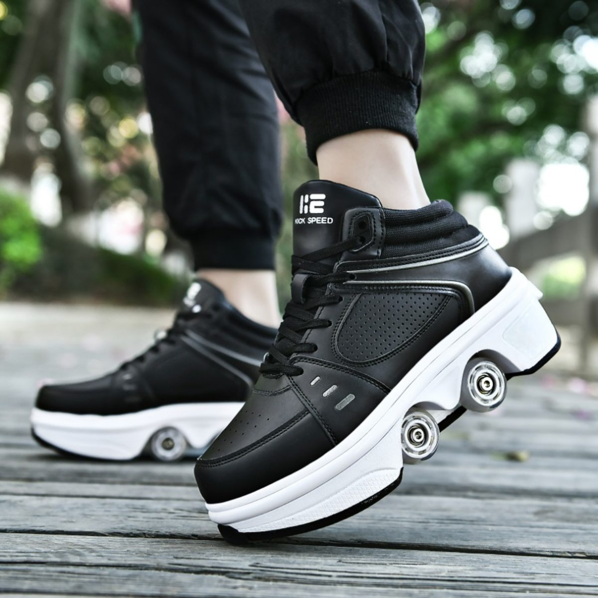 Kick Speed black LED sneakers with wheels for men, mid-top roller shoes on outdoor walkway
