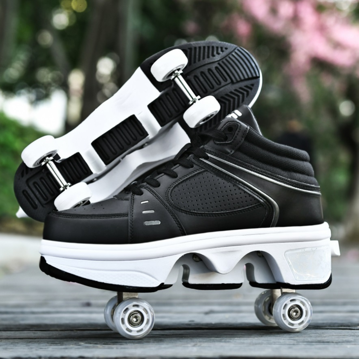 close-up of black Kick Speed roller skate shoes LED version, detailed bottom wheels and sole design