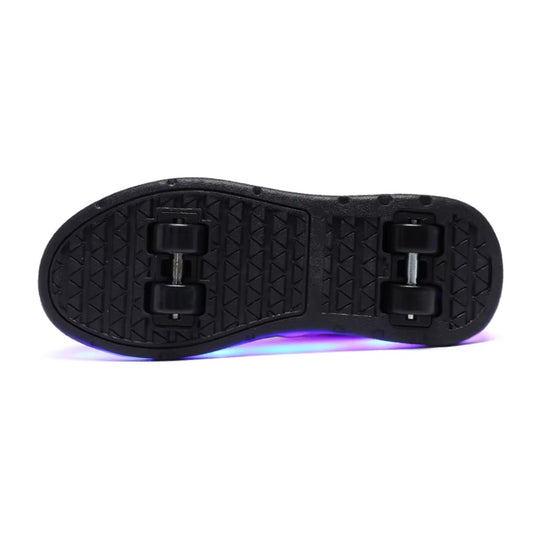 Black sole of a roller shoe with purple lighting on a white background