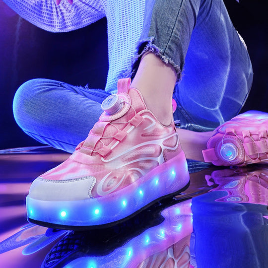 Pink LED heel wheel shoes with lights on a reflective surface.