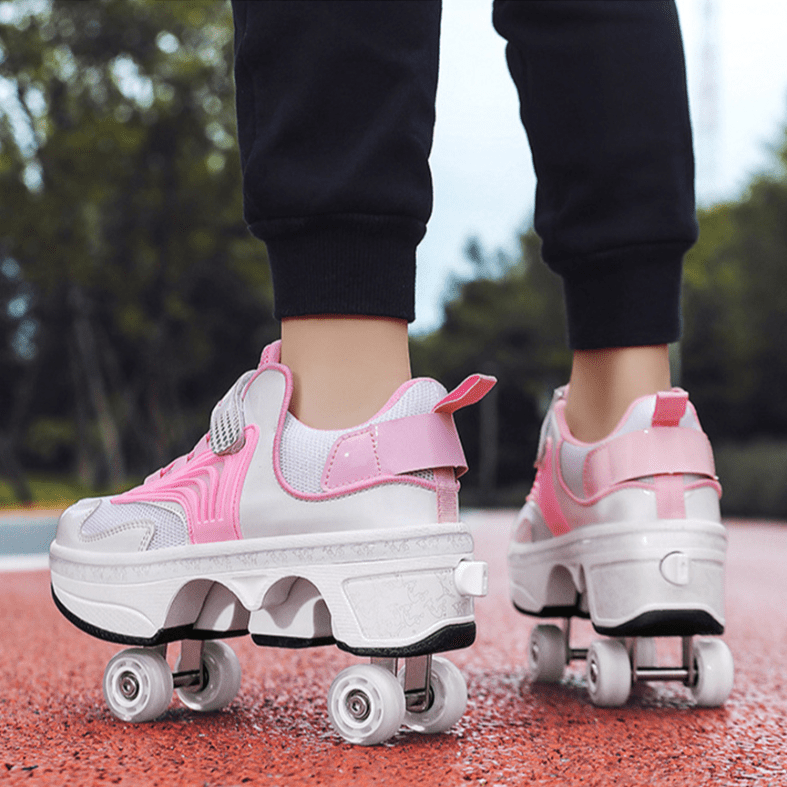 back angle of pink Kick Speed Pro-X Camo Edition LOW Roller Skate Shoes on track, displaying heel support and four-wheel alignment