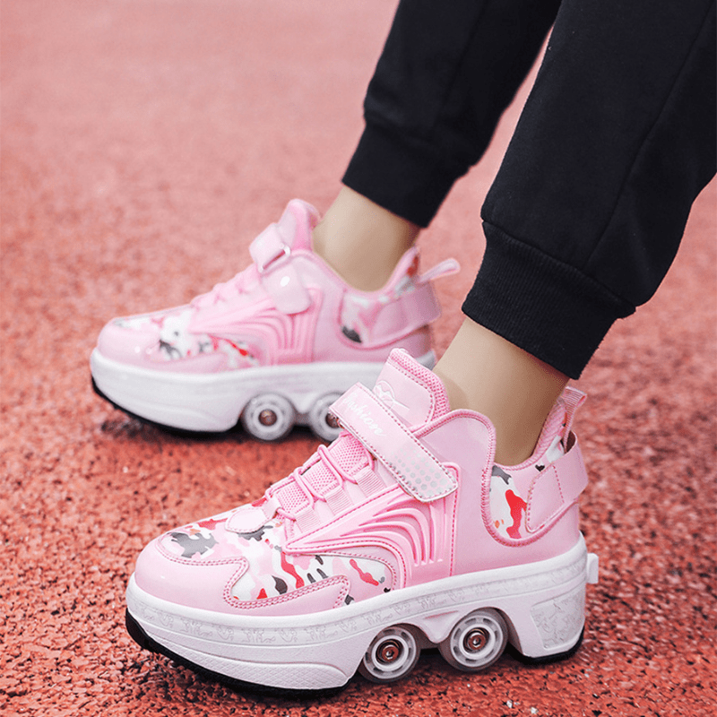 pink Kick Speed Pro-X Camo Edition LOW Roller Skate Shoes for kids being worn on red track, side outdoor perspective
