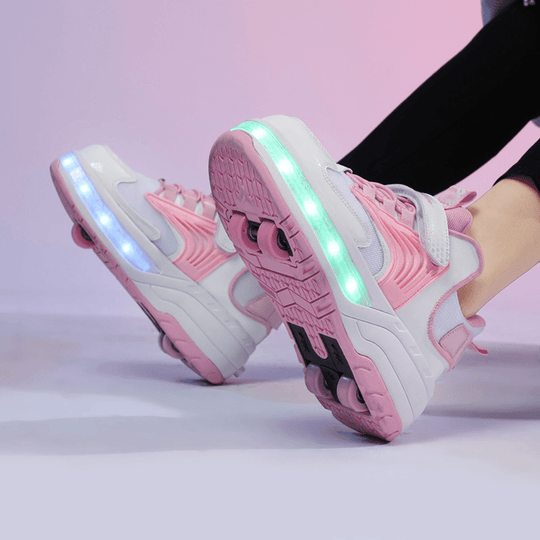 bottom of pink Kick Speed Pro-X LOW LED heel wheels shoes glowing