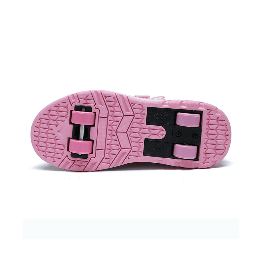 Sole of pink Pro-X LOW Heel Wheels Roller Shoes showing the rear wheel position and the front wheel position