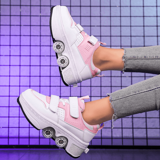 side angle of pink Kick Speed Supersonic LOW roller skate shoes mid-movement under soft lighting