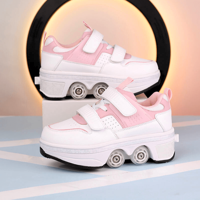 Kick Speed Supersonic roller skate shoes in pink and white with dual wheel setup on studio base