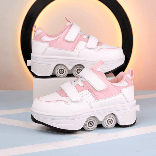 Kick Speed Supersonic roller skate shoes in pink and white with dual wheel setup on studio base