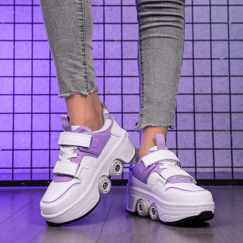 front view of purple low-top shoes with wheels for women worn with jeans under studio lights