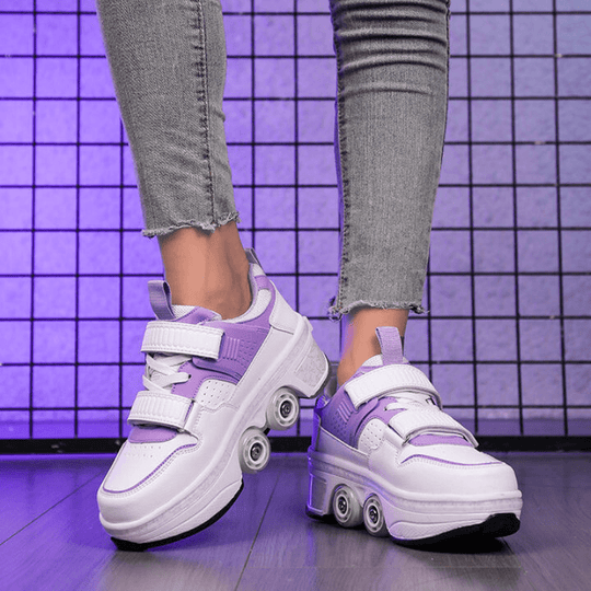 front view of purple low-top shoes with wheels for women worn with jeans under studio lights