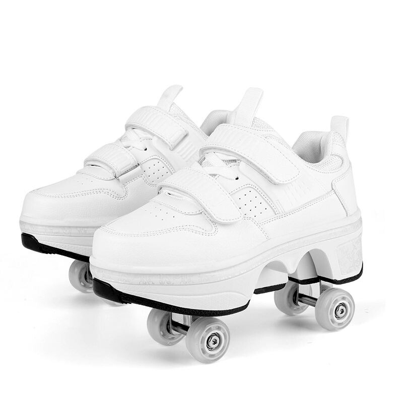 angled shot of white Kick Speed Supersonic roller skate shoes with wheel system visible