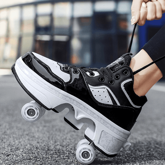black and white Kick Speed Vapor MID Roller Skate Shoes side view, pop-out wheel mechanism displayed