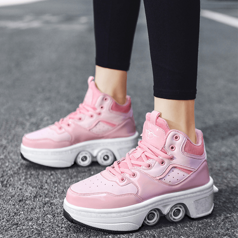side view of pink Kick Speed roller skate shoes mid-top design on asphalt, comfortable roller shoes for kids with wheels