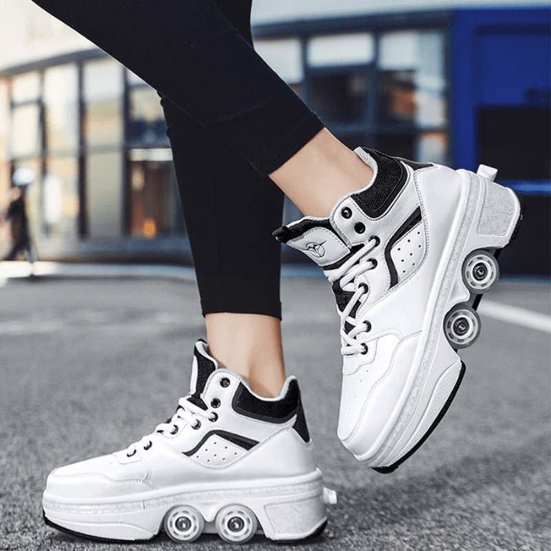 woman standing in white Kick Speed shoes with wheels, 4 wheel shoes with non-slip sole, outdoor photo on asphalt