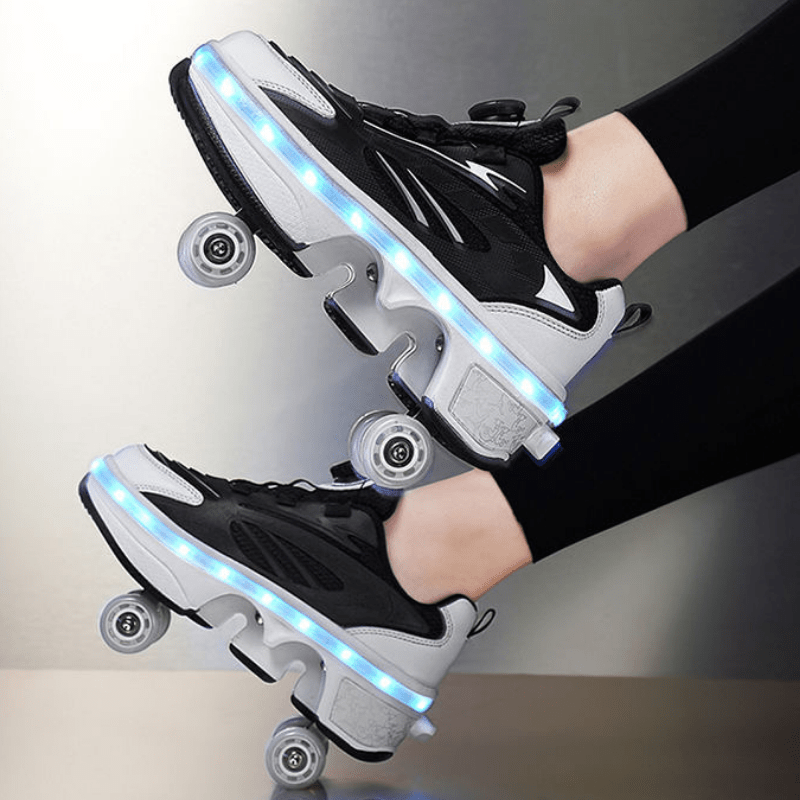 side view of black LED roller skate shoes showing retractable wheels and bright LED lights
