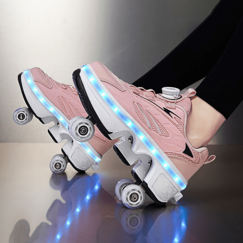 pink LED roller skate shoes with twist lock system for kids shown indoors