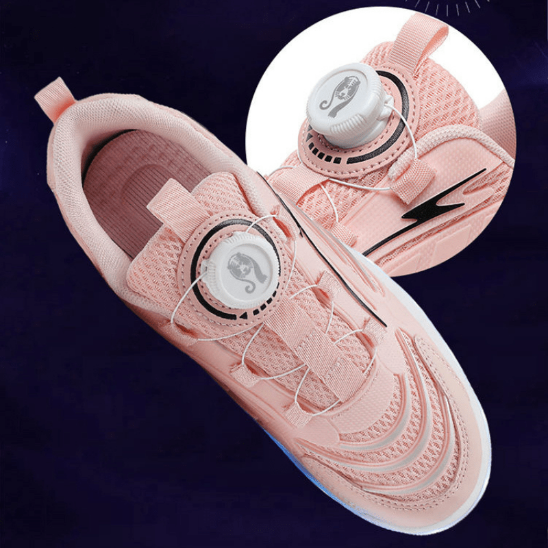 top-down studio shot of pink twist lock LED roller shoes highlighting control dial and light details