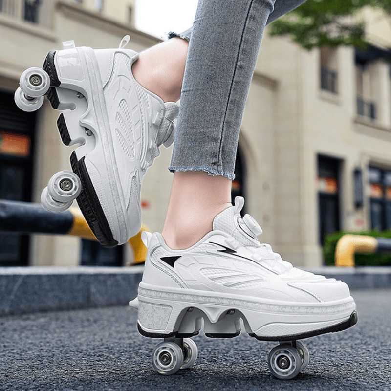 outdoor close-up of white LED roller shoes for women gliding on city street pavement